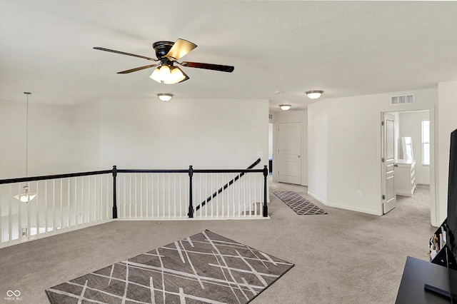 13525 Forest Glade Dr, Fishers, IN 46037 - carpeted spare room featuring a ceiling fan and baseboards