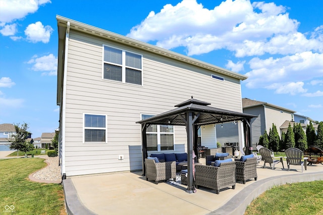 13525 Forest Glade Dr, Fishers, IN 46037 - back of property featuring outdoor lounge area, a gazebo, a patio, and a lawn