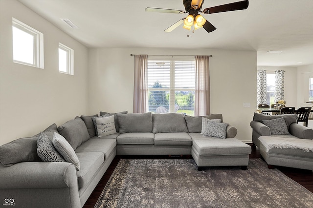 13525 Forest Glade Dr, Fishers, IN 46037 - living room featuring healthy amount of natural light, dark wood-type flooring, and ceiling fan