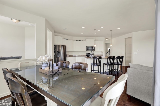13525 Forest Glade Dr, Fishers, IN 46037 - dining room featuring dark wood-type flooring and recessed lighting