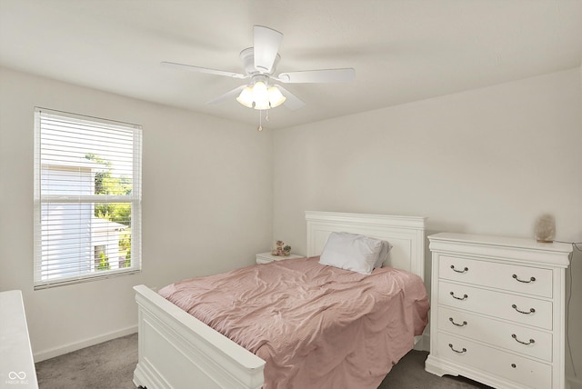 13525 Forest Glade Dr, Fishers, IN 46037 - carpeted bedroom with baseboards and ceiling fan