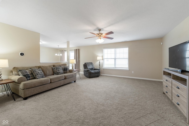 546 Greenwood Trace Dr, Whiteland, IN 46184 - living area with a chandelier, carpet, and a ceiling fan