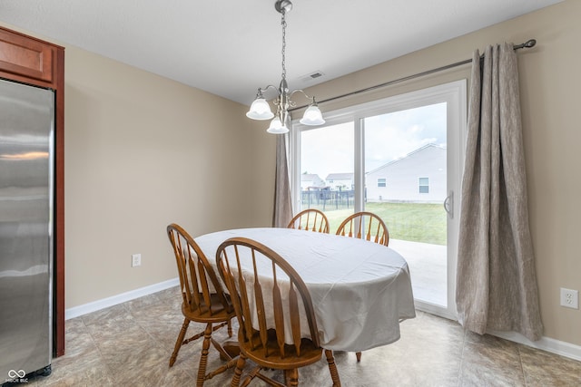 546 Greenwood Trace Dr, Whiteland, IN 46184 - dining room featuring a chandelier and baseboards