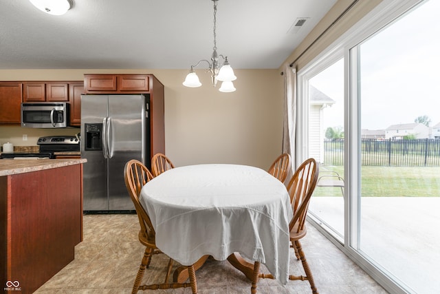 546 Greenwood Trace Dr, Whiteland, IN 46184 - dining room featuring a chandelier