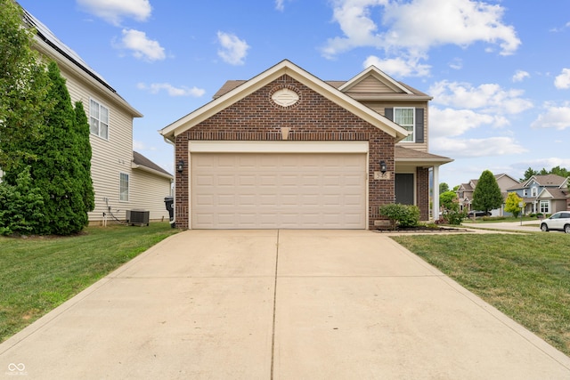 546 Greenwood Trace Dr, Whiteland, IN 46184 - traditional-style house with brick siding, a front lawn, and driveway