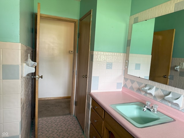 2212 Hanover Dr, Indianapolis, IN 46227 - bathroom with vanity, tile patterned floors, and tile walls