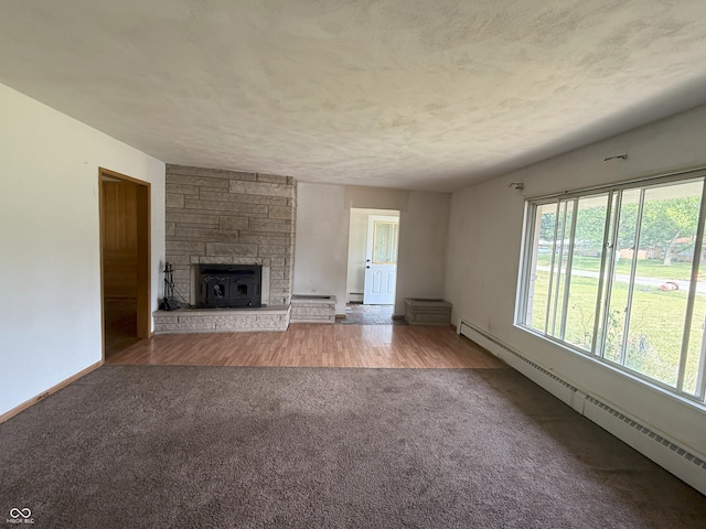 2212 Hanover Dr, Indianapolis, IN 46227 - unfurnished living room with a baseboard radiator, carpet, and a fireplace