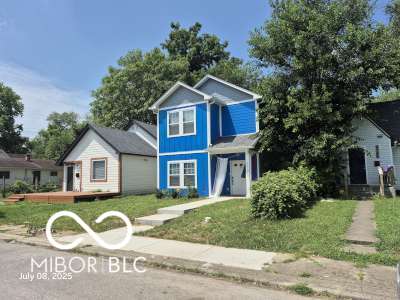 2140 Sugar Grove Ave, Indianapolis, IN 46202 - traditional-style home featuring a front lawn