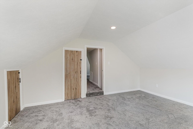 312 E Columbia St, Attica, IN 47918 - bonus room featuring carpet, lofted ceiling, and recessed lighting