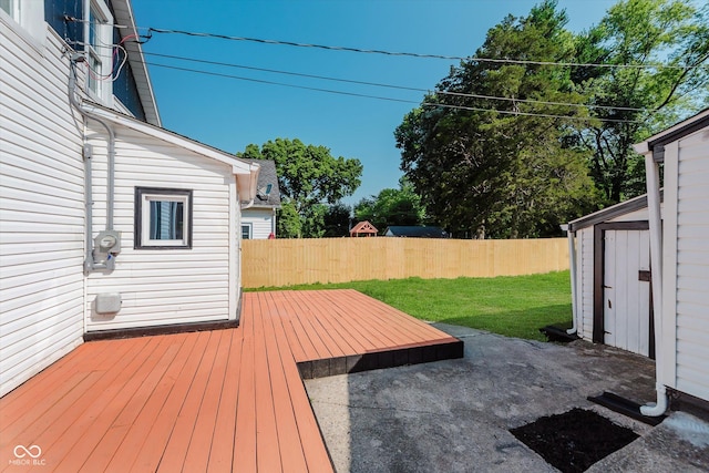312 E Columbia St, Attica, IN 47918 - wooden terrace with a fenced backyard and a shed