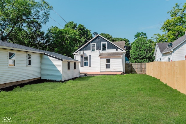 312 E Columbia St, Attica, IN 47918 - back of house with a wooden deck