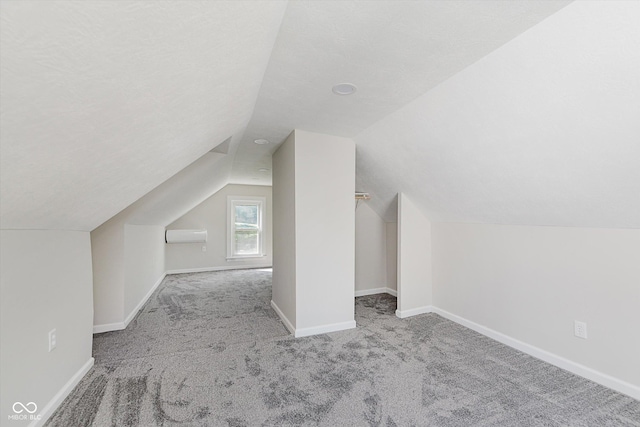 312 E Columbia St, Attica, IN 47918 - additional living space with lofted ceiling and carpet flooring