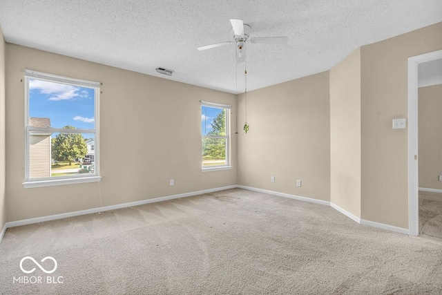 5971 Portman Pl, Plainfield, IN 46168 - carpeted spare room featuring a textured ceiling and a ceiling fan