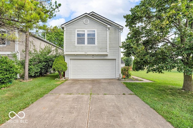 5971 Portman Pl, Plainfield, IN 46168 - view of front of home featuring a front yard, an attached garage, and driveway