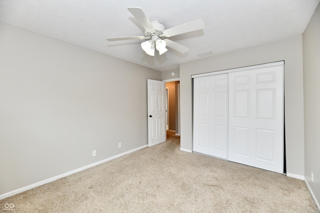 3675 Homestead Cir E, Plainfield, IN 46168 - unfurnished bedroom featuring carpet flooring, a closet, and a ceiling fan