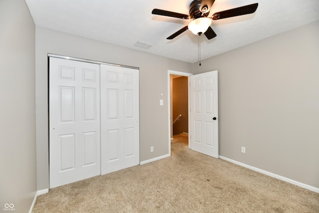 3675 Homestead Cir E, Plainfield, IN 46168 - unfurnished bedroom featuring carpet, a closet, and a ceiling fan