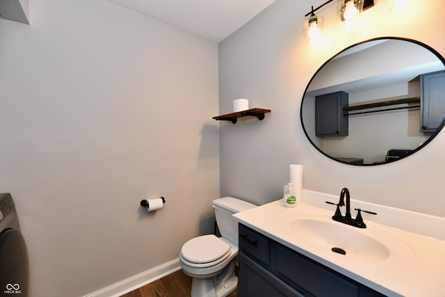 3675 Homestead Cir E, Plainfield, IN 46168 - half bath featuring washer / dryer, wood finished floors, and vanity