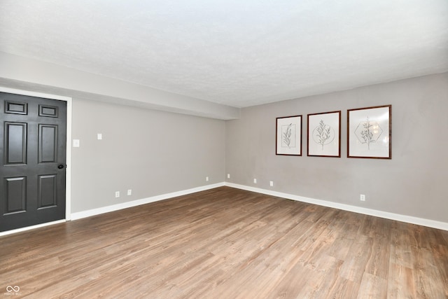 3675 Homestead Cir E, Plainfield, IN 46168 - spare room with wood finished floors and baseboards