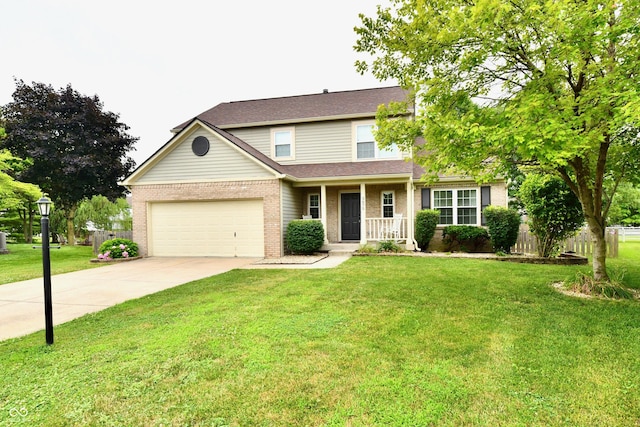 3675 Homestead Cir E, Plainfield, IN 46168 - traditional home with driveway, brick siding, a porch, and a garage
