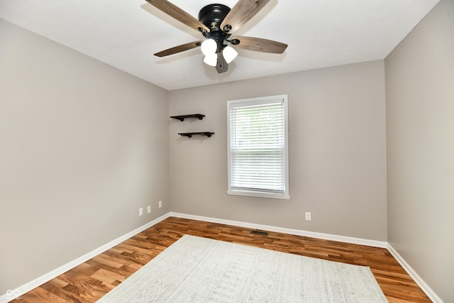 3675 Homestead Cir E, Plainfield, IN 46168 - empty room with wood finished floors and a ceiling fan
