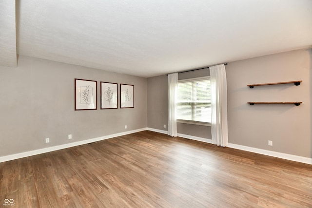 3675 Homestead Cir E, Plainfield, IN 46168 - empty room featuring wood finished floors and baseboards