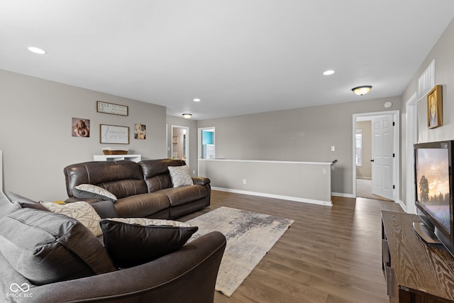 1425 Turkington Ct, Greenwood, IN 46143 - living room with wood finished floors, healthy amount of natural light, and recessed lighting