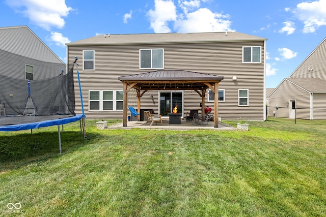 1425 Turkington Ct, Greenwood, IN 46143 - rear view of property featuring a gazebo, a trampoline, and a patio
