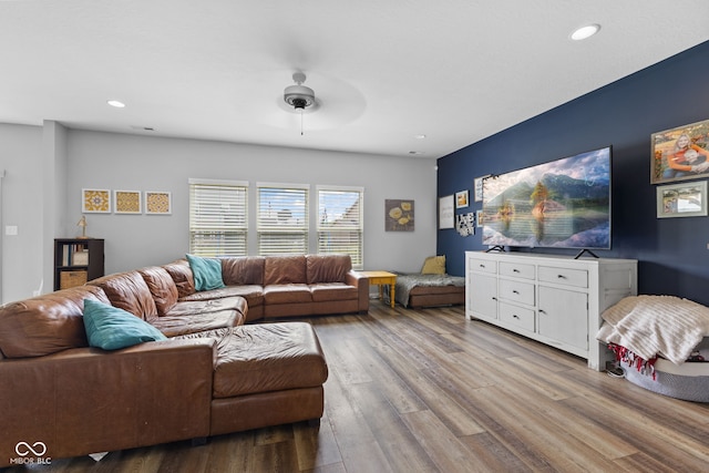 1425 Turkington Ct, Greenwood, IN 46143 - living area with wood finished floors, recessed lighting, and a ceiling fan