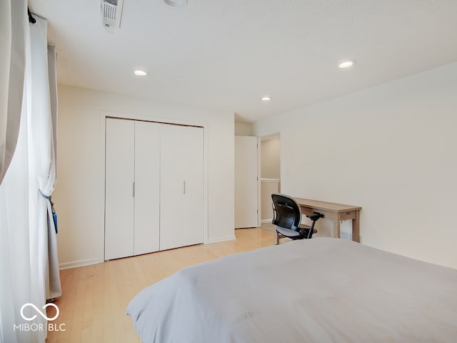 11668 Victoria Ct, Carmel, IN 46033 - bedroom with light wood-type flooring, recessed lighting, and a closet