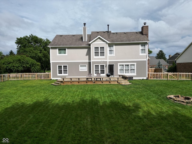 11668 Victoria Ct, Carmel, IN 46033 - back of property featuring a chimney, a fenced backyard, a deck, and a shingled roof