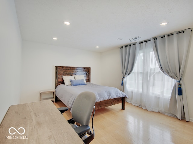 11668 Victoria Ct, Carmel, IN 46033 - bedroom with recessed lighting and light wood-style flooring