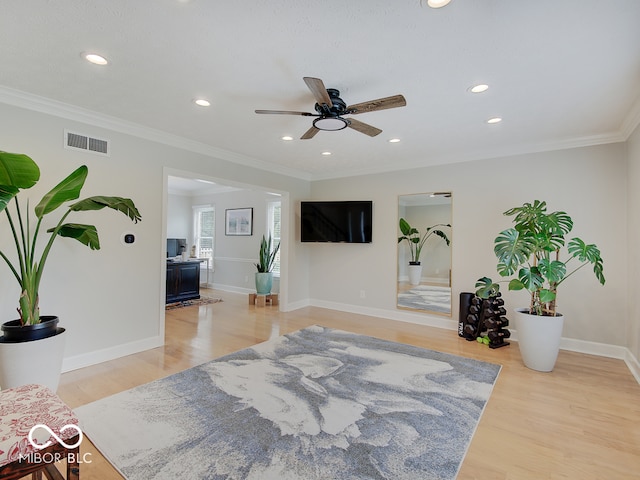11668 Victoria Ct, Carmel, IN 46033 - living area featuring ceiling fan, light wood-style floors, recessed lighting, and ornamental molding