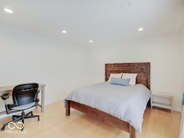 11668 Victoria Ct, Carmel, IN 46033 - bedroom with wood finished floors, recessed lighting, and an office area
