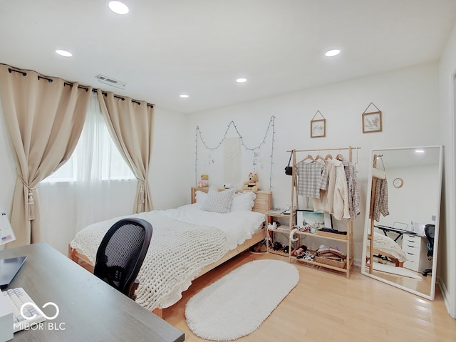 11668 Victoria Ct, Carmel, IN 46033 - bedroom with wood finished floors and recessed lighting