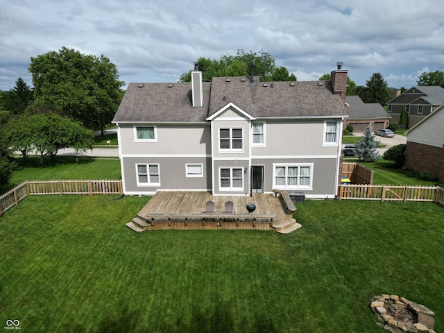 11668 Victoria Ct, Carmel, IN 46033 - back of house featuring a chimney, a fenced backyard, a wooden deck, and roof with shingles