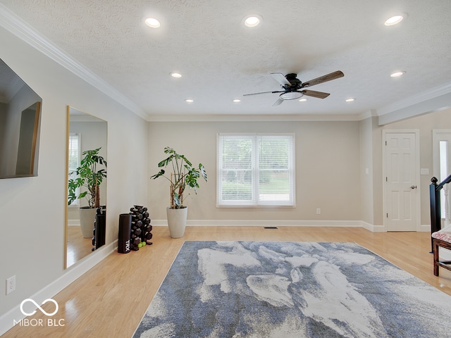 11668 Victoria Ct, Carmel, IN 46033 - workout room with ceiling fan, light wood-style flooring, recessed lighting, and ornamental molding