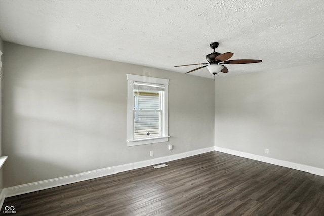 363 N 19th Ave, Beech Grove, IN 46107 - empty room with dark wood finished floors, a ceiling fan, and a textured ceiling