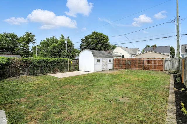 363 N 19th Ave, Beech Grove, IN 46107 - fenced backyard featuring a storage shed and a patio area