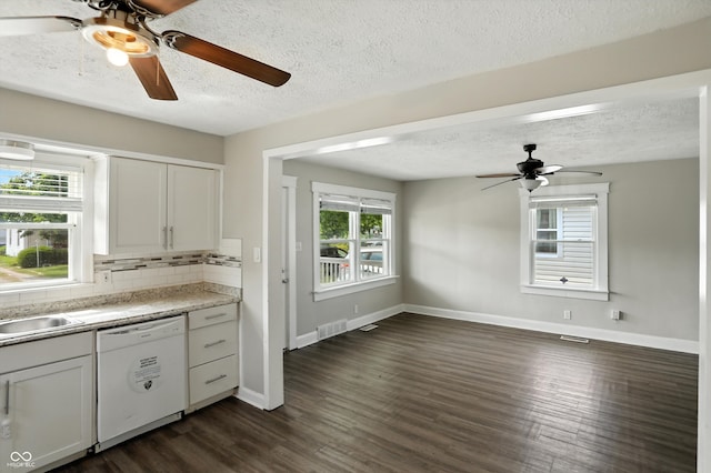 363 N 19th Ave, Beech Grove, IN 46107 - kitchen featuring dishwasher, a ceiling fan, decorative backsplash, dark wood finished floors, and a textured ceiling