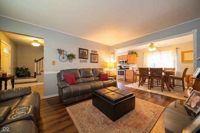 5514 Meckes Ln, Indianapolis, IN 46237 - living area with stairway, dark wood-type flooring, and ceiling fan