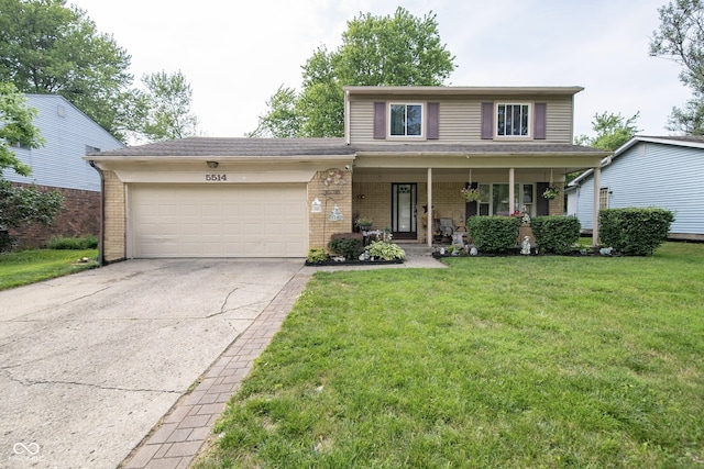 5514 Meckes Ln, Indianapolis, IN 46237 - traditional-style house featuring driveway, an attached garage, brick siding, covered porch, and a front yard