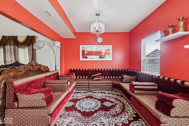 2302 Ashton Ln, Greenwood, IN 46143 - living area featuring a chandelier
