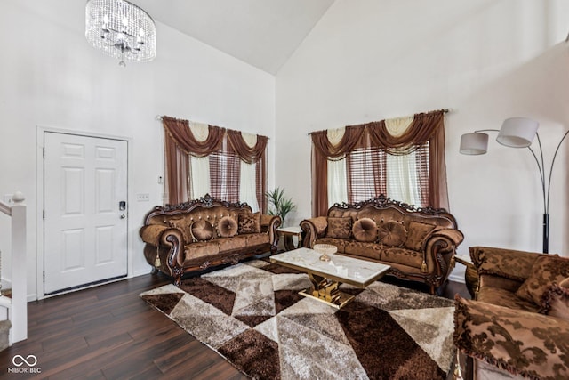 2302 Ashton Ln, Greenwood, IN 46143 - living area featuring high vaulted ceiling, wood finished floors, and a chandelier