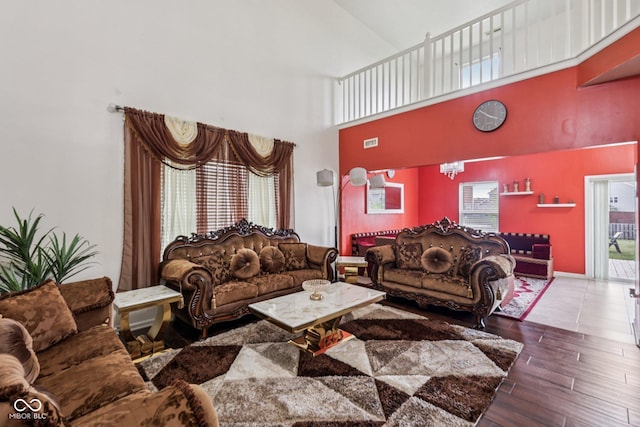 2302 Ashton Ln, Greenwood, IN 46143 - living area featuring a towering ceiling and wood finished floors