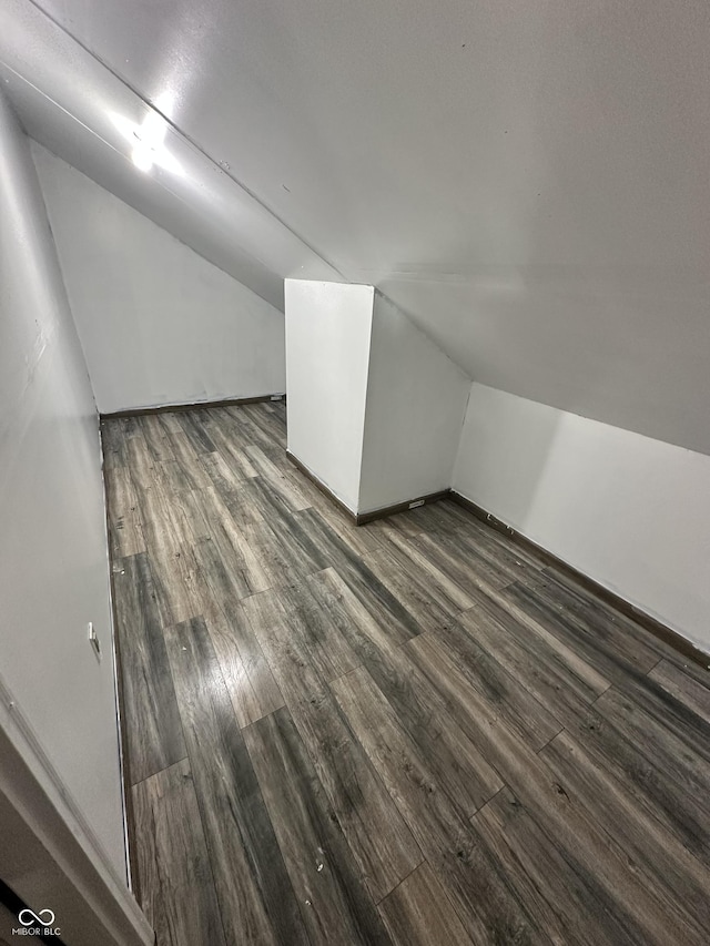 2302 Ashton Ln, Greenwood, IN 46143 - bonus room with lofted ceiling and dark wood-type flooring