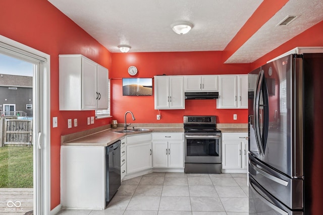 2302 Ashton Ln, Greenwood, IN 46143 - kitchen with freestanding refrigerator, electric range, under cabinet range hood, dishwasher, and white cabinetry