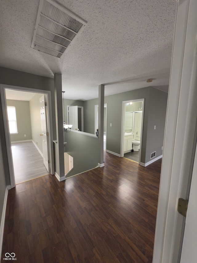 1881 Harvest Meadow Dr, Greenwood, IN 46143 - empty room featuring wood finished floors and a textured ceiling