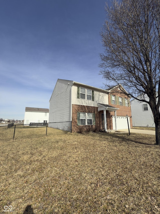 1881 Harvest Meadow Dr, Greenwood, IN 46143 - view of front of home featuring an attached garage and brick siding
