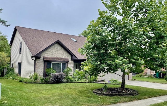 7410 Crickwood Pl, Indianapolis, IN 46268 - view of front of house featuring roof with shingles, a front lawn, and concrete driveway