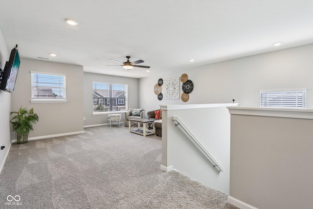 338 Limerick Ln, Pendleton, IN 46064 - living area with an upstairs landing, carpet floors, a ceiling fan, and recessed lighting
